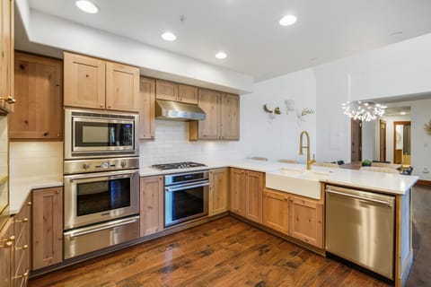 Upgraded kitchen with double ovens.