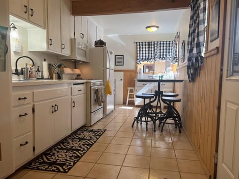 kitchen, eating area, includes coffee station and small bar area
