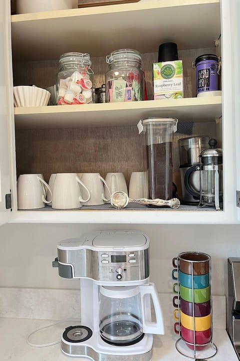 Choice of coffee makers - drip pot or single serve, kettle, pour over.  Starter coffee, tea creamer, sugars provided.