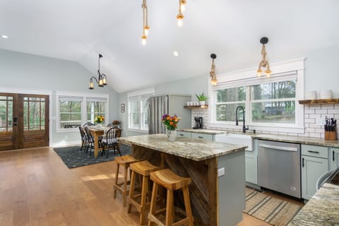 Open dining and kitchen areas.