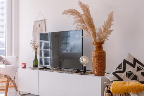 Sunny living room with vintage dining area