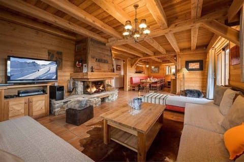 Take a seat in front of the fireplace and enjoy a movie in the living area.