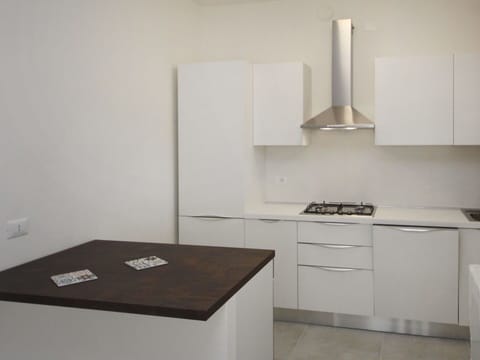 Cabinetry, Wood, Kitchen, Interior Design, Kitchen Stove, Floor, Hardwood, Flooring, Rectangle