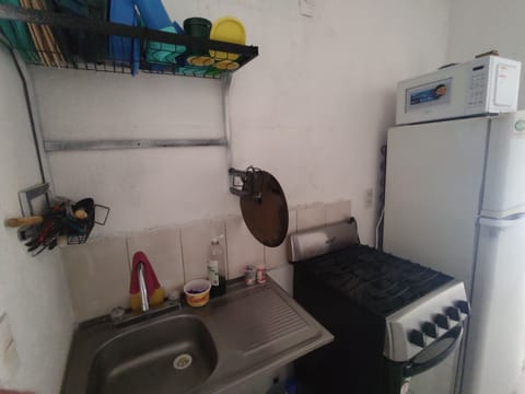 Fridge, microwave, oven, cookware/dishes/utensils