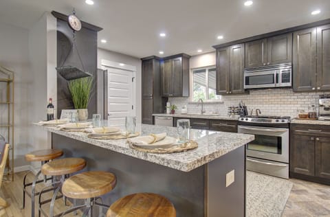 Open concept into the chef's kitchen and plenty of seating for a large group