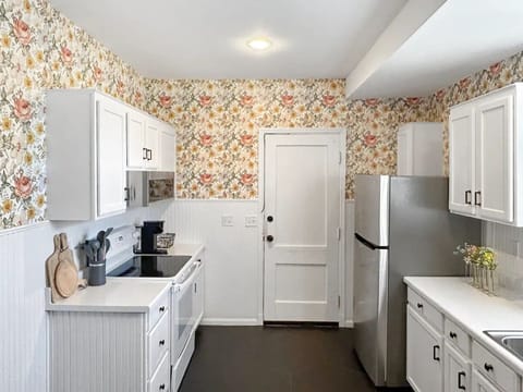 This is your fully-stocked kitchen. Dining table and dishwasher, not pictured.