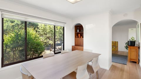 A lovely dining area with huge windows at the side, so you don't miss out on any of the views. 
