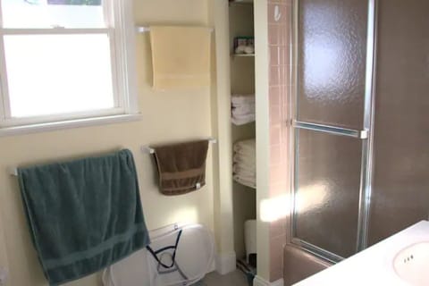 Combined shower/tub, hair dryer, towels, soap