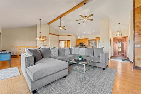 Open concept seating, dining and kitchen