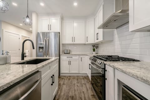 Modern Open Kitchen with high-end appliances and large island perfect for entertaining