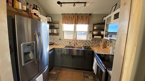 Bright, and inviting kitchen with everything you need to cook a ranch feast!