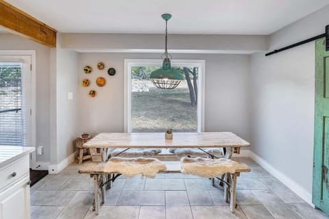 La Casa has a dining table + 3 seats at the kitchen counter for dining.