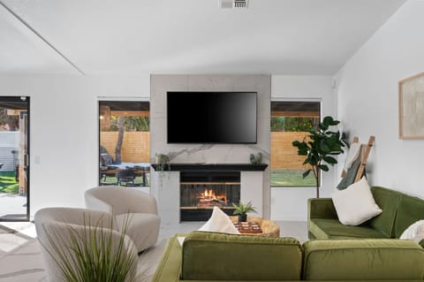 Smart TV, fireplace, table tennis, books