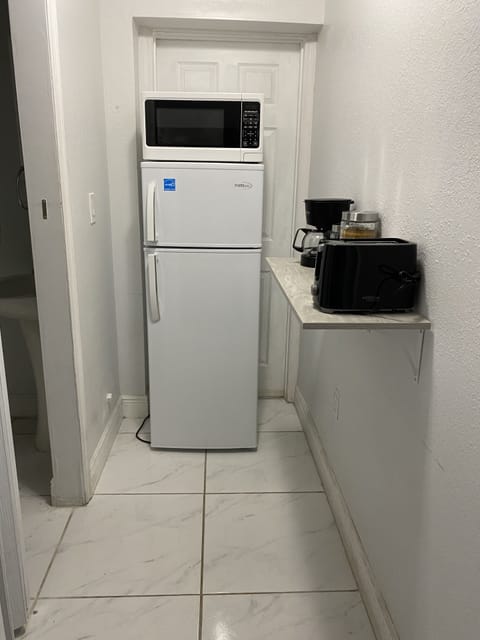 Fridge, microwave, coffee/tea maker, toaster