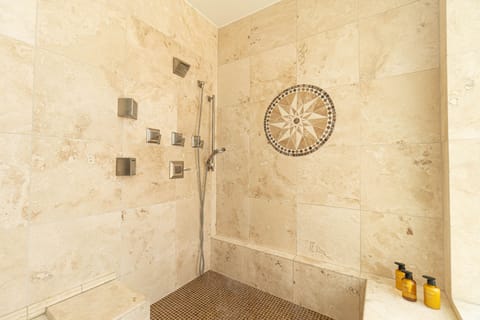 Combined shower/tub, towels, soap, shampoo