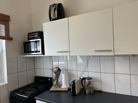 Fridge, microwave, oven, coffee/tea maker