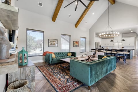 Open concept with living, dining, and kitchen connected.