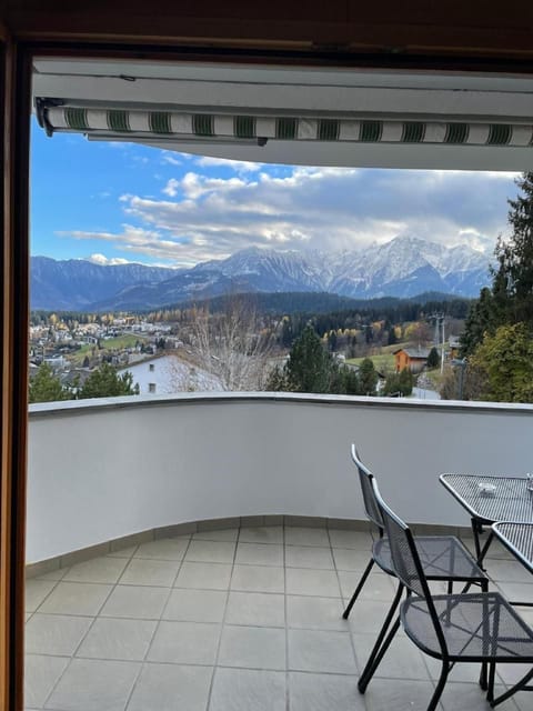 Covered front balcony with panoramic view over Flims
