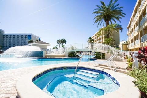 Hot tub by pool.