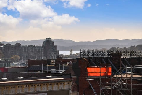 Enjoy the Peek-A-Boo Views of the Famous Inner Harbour / Ocean Views from your private roof top patio! 