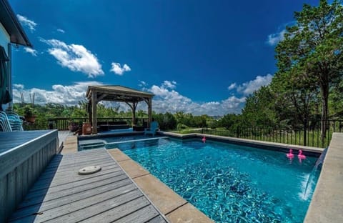 Gorgeous pool with waterfall and shelf to enjoy, relaxing and getting some sun1