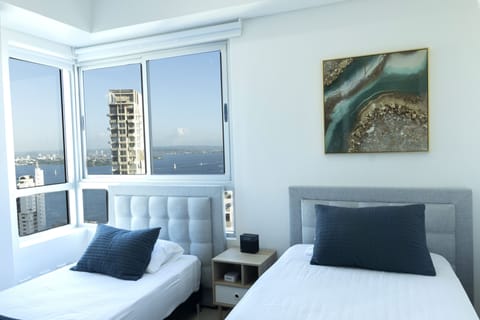 Guest bedroom with a view of the bay.