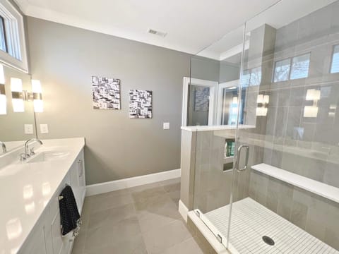 Combined shower/tub, hair dryer, towels, soap