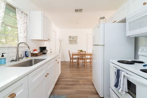 Open-concept kitchen flowing into the dining area for easy entertaining.