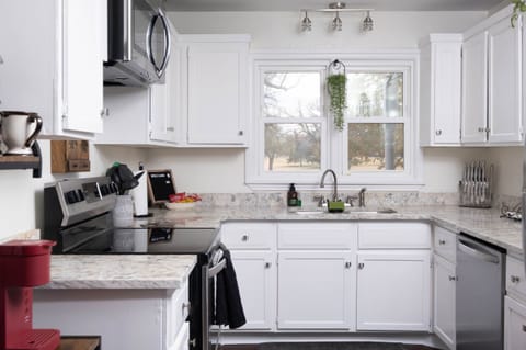 Fully Stocked Kitchen looking at the Park