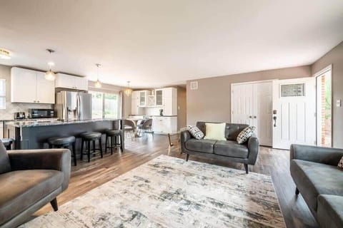 Kick back and relax in the spacious living room and the open layout between the kitchen, dining room, and living room!