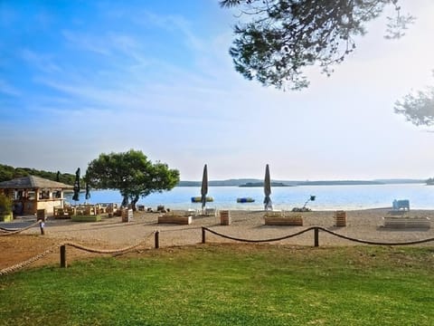 Beach nearby, sun loungers