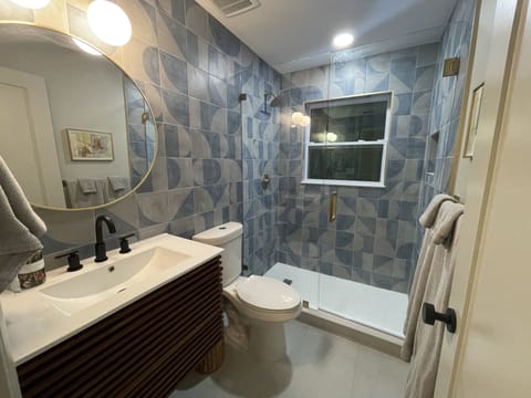 Combined shower/tub, hair dryer, towels, soap