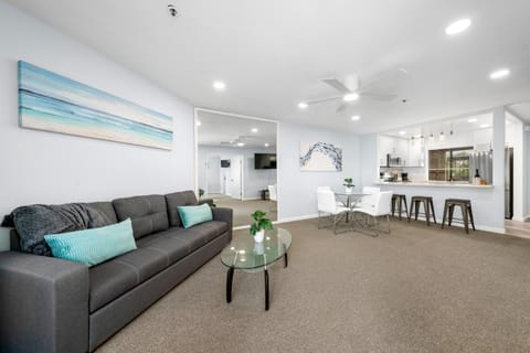 Open floor spacious living room with a sofa bed