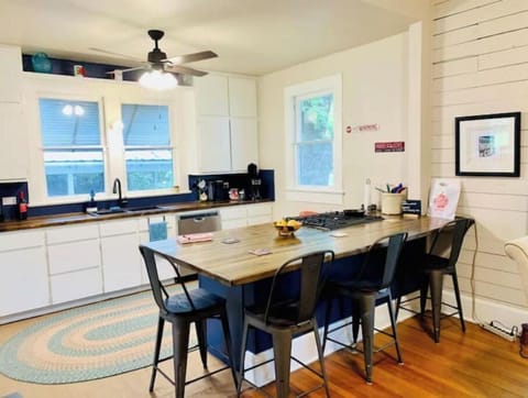 The kitchen peninsula in the heart of the home features a 4'x8' custom counter.
