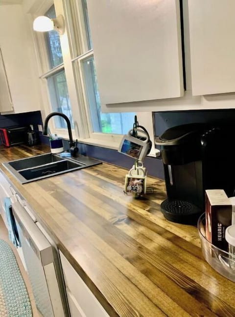 The kitchen is fully stocked with cookware, silverware & everything needed.