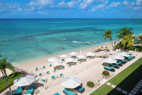 On the beach, sun loungers, beach towels