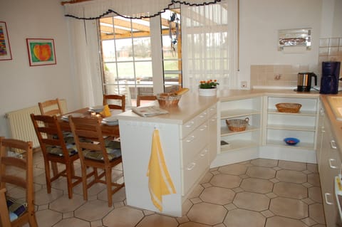 Dishwasher, highchair, dining tables