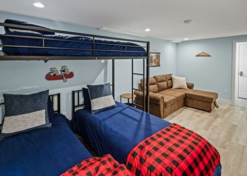 3 Twin beds/ Pull out sofa (basement)