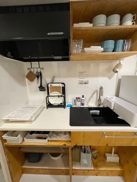 Fridge, microwave, stovetop, cookware/dishes/utensils