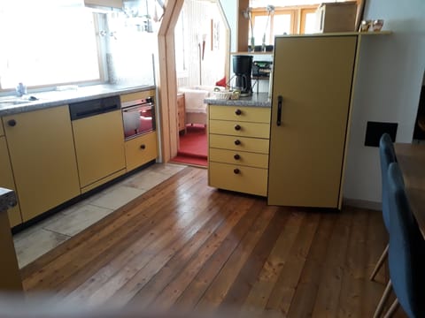 Fridge, stovetop, dishwasher, coffee/tea maker