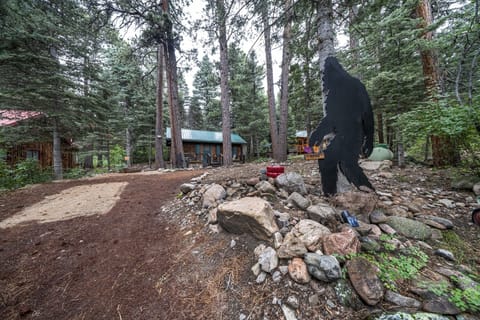 Big Foot waiting to welcome you at the front of the cabin 