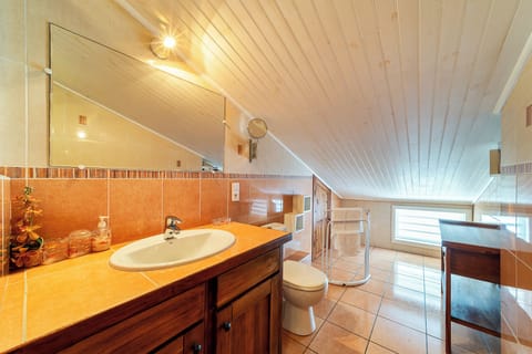 Combined shower/tub, hair dryer, towels, toilet paper