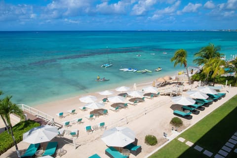 On the beach, sun loungers, beach towels