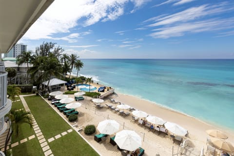 On the beach, sun loungers, beach towels