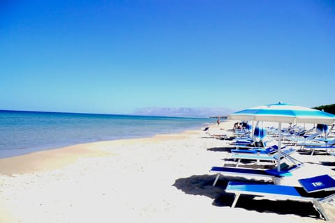 Beach nearby, sun loungers