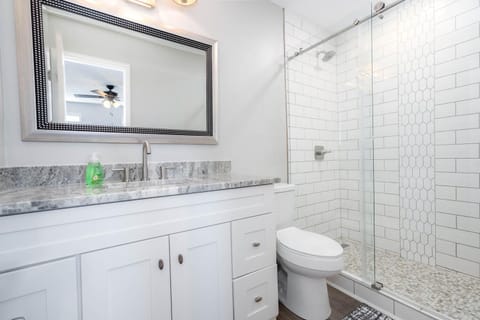 Combined shower/tub, hair dryer, towels, soap