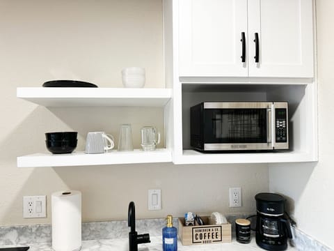 Fridge, microwave, stovetop, coffee/tea maker