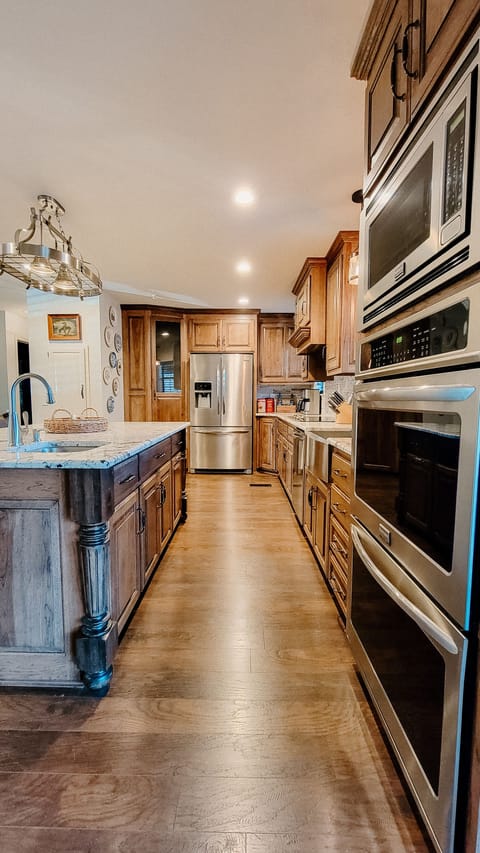 Kitchen with double convection ovens, island sink, extra large fridge, etc! 
