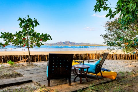 On the beach, sun loungers, beach towels