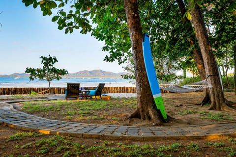 On the beach, sun loungers, beach towels